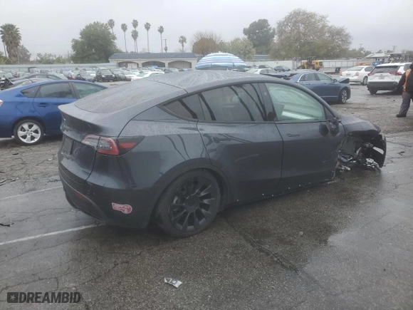 2024 Tesla Model Y with VIN 7SAYGDED5RF054851, listed as a Copart auction lot 42835055 with 14,695 mi miles and Salvage Title. Bid and sale history available at carsss.com. Image 3.