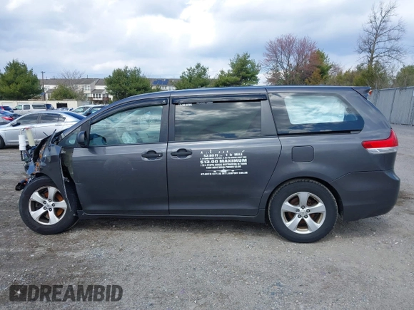 2014 Toyota Sienna L with VIN 5TDZK3DC4ES407928, listed as a IAAI auction lot 41887349 with 208,289 mi miles. Bid and sale history available at carsss.com. Image 14.