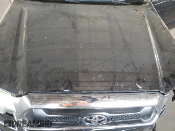 2015 Toyota Tacoma z VIN 3TMLU4EN9FM192716, wystawiony jako Copart lot #61462045 z przebiegiem 103 240 mil mil oraz Szkoda całkowita • Salvage title. Historia ofert i sprzedaży dostępna na DreamBid. Obrazek 11.