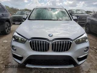 2018 BMW X1 xDrive28i with VIN WBXHT3C3XJ3H30795, listed as a Copart auction lot 49722023 with 12,190 mi miles. Bid and sale history available at carsss.com. Image 5.