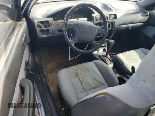 1997 Toyota Tercel CE z VIN JT2AC52L7V0212023, wystawiony jako Copart lot #49150285 z przebiegiem 74 742 mil mil oraz Czysty tytuł • Clean title. Historia ofert i sprzedaży dostępna na DreamBid. Obrazek 8.