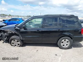 2005 Honda Pilot EX-L with NAVI with VIN 2HKYF18715H562492, listed as a IAAI auction lot 41627194 with 184,653 mi miles. Bid and sale history available at carsss.com. Image 14.