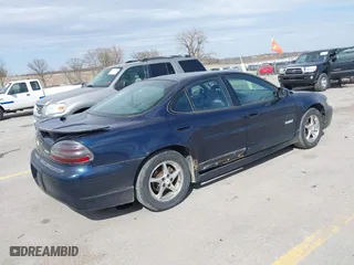 2003 Pontiac Grand Prix GT with VIN 1G2WP52K53F148801, listed as a IAAI auction lot 41888412 with 135,142 mi miles. Bid and sale history available at carsss.com. Image 4.