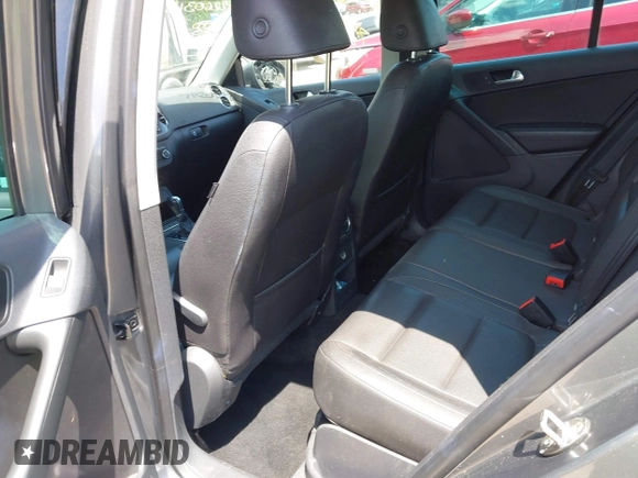 2012 Volkswagen Tiguan SE with VIN WVGAV7AX9CW004362, listed as a IAAI auction lot 42260316 with 163,444 mi miles and . Bid and sale history available at DreamBid. Image 8.