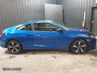 2016 Honda Civic Coupe Touring with VIN 2HGFC3B95GH350813, listed as a IAAI auction lot 41531873 with 99,409 mi miles. Bid and sale history available at carsss.com. Image 13.