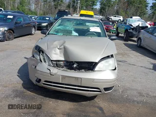 2007 Ford Focus S with VIN 1FAFP34N47W270598, listed as a IAAI auction lot 42133025 with 158,515 mi miles and . Bid and sale history available at carsss.com. Image 12.