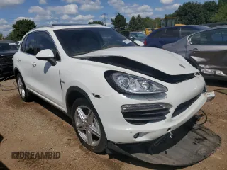 2014 Porsche Cayenne S Hybrid with VIN WP1AE2A26ELA50374, listed as a Copart auction lot 68050454 with 169,444 mi miles and Salvage title. Bid and sale history available at DreamBid. Image 4.