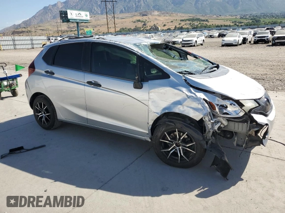 2016 Honda Fit LX with VIN JHMGK5H5XGX020620, listed as a Copart auction lot 60337295 with 103,827 mi miles and Salvage title. Bid and sale history available at DreamBid. Image 4.