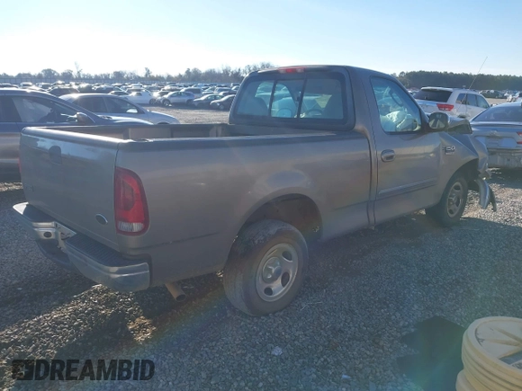 2002 Ford F-150 XL with VIN 1FTRF17W02NB01695, listed as a IAAI auction lot 41230523 with 398,649 mi miles. Bid and sale history available at carsss.com. Image 4.
