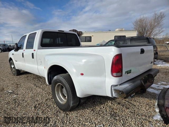1999 Ford F-350 XL z VIN 1FTWW32F4XED65158, wystawiony jako Copart lot #41690765 z przebiegiem 147 314 mil mil oraz Czysty tytuł • Clean title. Historia ofert i sprzedaży dostępna na DreamBid. Obrazek 3.