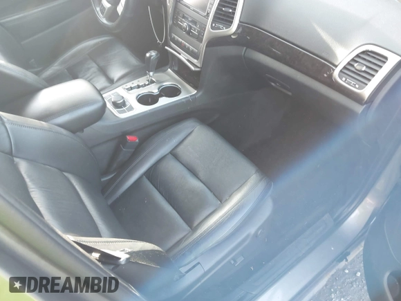 2011 Jeep Grand Cherokee 70th Anniversary with VIN 1J4RR4GT6BC715848, listed as a IAAI auction lot 41562152 with 119,910 mi miles. Bid and sale history available at carsss.com. Image 5.