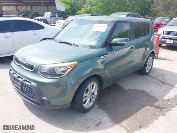 2014 Kia Soul + with VIN KNDJP3A52E7048657, listed as a IAAI auction lot 41940455 with 166,423 mi miles. Bid and sale history available at carsss.com. Image 2.