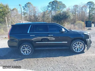 2016 Cadillac Escalade Platinum with VIN 1GYS4DKJ5GR305102, listed as a IAAI auction lot 39906183 with 133,432 mi miles. Bid and sale history available at carsss.com. Image 13.
