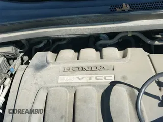 2009 Honda Odyssey EX z VIN 5FNRL38479B403933, wystawiony jako IAAI lot #43186917 z przebiegiem 225 358 mil mil oraz . Historia ofert i sprzedaży dostępna na DreamBid. Obrazek 19.