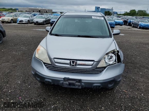 2007 Honda CR-V EX-L z VIN JHLRE48767C107065, wystawiony jako Copart lot #57261965 z przebiegiem 160 752 mil mil oraz Szkoda całkowita • Salvage title. Historia ofert i sprzedaży dostępna na DreamBid. Obrazek 5.