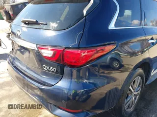 2020 Infiniti QX60 Luxe with VIN 5N1DL0MM5LC518335, listed as a IAAI auction lot 41599967 with 48,548 mi miles and . Bid and sale history available at DreamBid. Image 17.