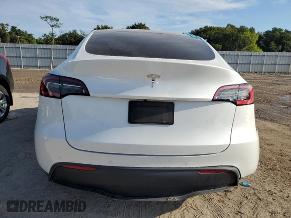 2021 Tesla Model Y Standard Range z VIN 5YJYGDED4MF107030, wystawiony jako Copart lot #66382913 z przebiegiem 39 024 mil mil oraz Szkoda całkowita • Salvage title. Historia ofert i sprzedaży dostępna na DreamBid. Obrazek 6.