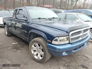 2002 Dodge Dakota SLT with VIN 1B7GL42X72S649714, listed as a IAAI auction lot 41426396 with 227,056 mi miles. Bid and sale history available at carsss.com. Image 1.