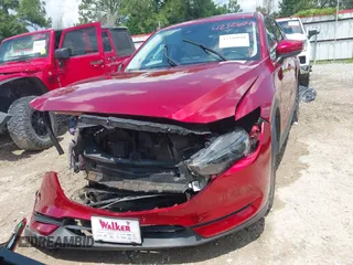 2018 Mazda CX-5 Grand Touring with VIN JM3KFADM4J0335913, listed as a IAAI auction lot 42326044 with 104,583 mi miles and . Bid and sale history available at DreamBid. Image 13.