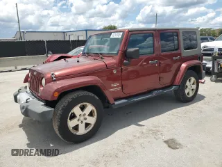 2008 Jeep Wrangler Unlimited Sahara с VIN 1J4GA59178L644314, выставлен на аукционе Copart как лот 62167935 с пробегом 124 415 миль миль и Чистый • Clean title. История ставок и продаж доступна на DreamBid. Изображение 1.