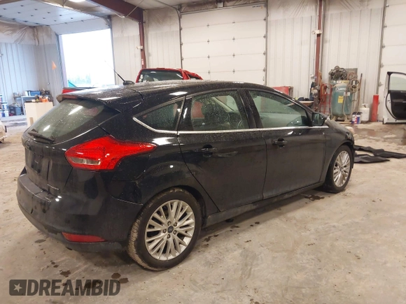 2017 Ford Focus Titanium with VIN 1FADP3N25HL222297, listed as a IAAI auction lot 41698707 with 121,756 mi miles and . Bid and sale history available at carsss.com. Image 4.