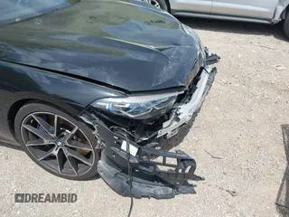 2019 BMW 8 Series M850i xDrive with VIN WBABC4C59KBU96788, listed as a IAAI auction lot 42286659 with 26,913 mi miles and . Bid and sale history available at DreamBid. Image 18.