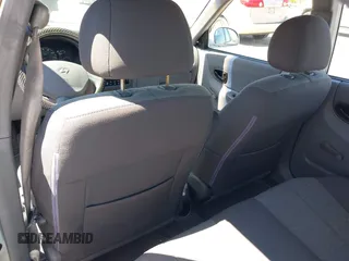 2005 Hyundai Accent GLS with VIN KMHCG45C75U658672, listed as a IAAI auction lot 42107140 with 34,351 mi miles. Bid and sale history available at carsss.com. Image 14.