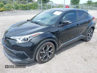 2018 Toyota C-HR XLE with VIN NMTKHMBX0JR008423, listed as a IAAI auction lot 42091445 with 124,811 mi miles. Bid and sale history available at carsss.com. Image 2.