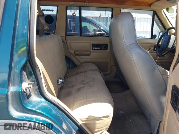 1995 Jeep Cherokee Sport with VIN 1J4FJ68S7SL631078, listed as a IAAI auction lot 42408148 with 190,765 mi miles and . Bid and sale history available at DreamBid. Image 8.