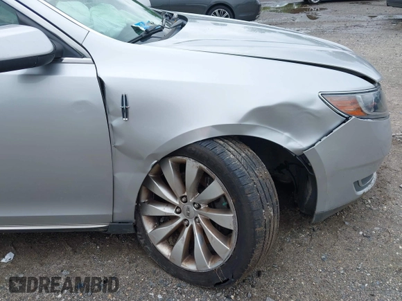 2013 Lincoln MKS with VIN 1LNHL9DK4DG606551, listed as a IAAI auction lot 42343140 with 70,424 mi miles and . Bid and sale history available at DreamBid. Image 6.