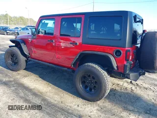2014 Jeep Wrangler Unlimited Sport with VIN 1C4BJWDG2EL126480, listed as a IAAI auction lot 41479323 with 93,192 mi miles. Bid and sale history available at carsss.com. Image 3.
