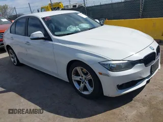 2015 BMW 3 Series 328i with VIN WBA3A5G51FNS89956, listed as a IAAI auction lot 42012575 with 121,246 mi miles. Bid and sale history available at carsss.com. Image 1.