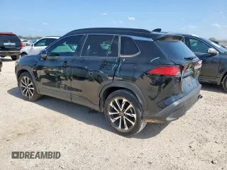 2023 Toyota Corolla Cross XLE with VIN 7MUDAAAG2PV072301, listed as a Copart auction lot 61547155 with 25,017 mi miles and Salvage title. Bid and sale history available at DreamBid. Image 2.