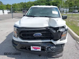 2023 Ford F-150 XL with VIN 1FTMF1CP7PKF84555, listed as a IAAI auction lot 42197597 with 12,216 mi miles and . Bid and sale history available at DreamBid. Image 13.