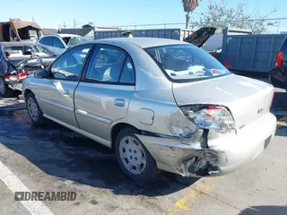 2002 Kia Rio with VIN KNADC123X26183989, listed as a IAAI auction lot 41837792 with 116,746 mi miles. Bid and sale history available at carsss.com. Image 6.