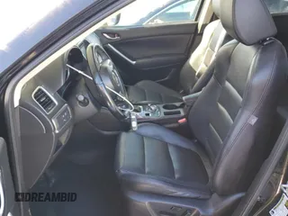 2016 Mazda CX-5 Grand Touring with VIN JM3KE4DY6G0655802, listed as a Copart auction lot 43820475 with 76,639 mi miles and Salvage Title. Bid and sale history available at carsss.com. Image 7.