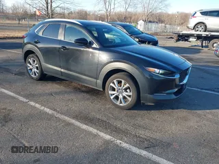 2023 Mazda CX-30 2.5 S Select Package with VIN 3MVDMBBM3PM584854, listed as a IAAI auction lot 41736925 with 39,008 mi miles. Bid and sale history available at carsss.com. Image 1.
