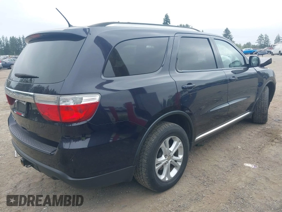 2013 Dodge Durango SXT with VIN 1C4RDJAG5DC697022, listed as a IAAI auction lot 42474060 with 159,723 mi miles and . Bid and sale history available at DreamBid. Image 4.