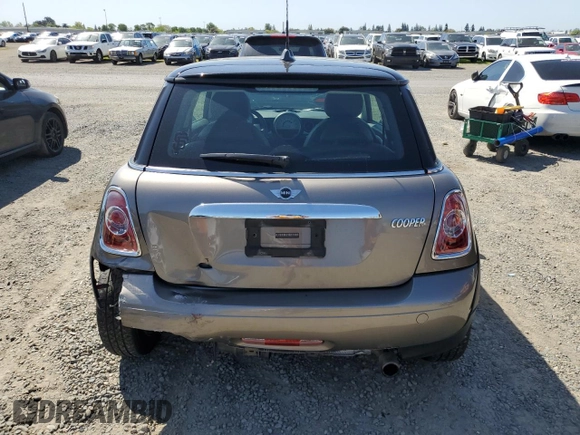 2013 MINI Hardtop with VIN WMWSU3C57DT678736, listed as a Copart auction lot 52586285 with 64,563 mi miles and Salvage Title. Bid and sale history available at DreamBid. Image 6.