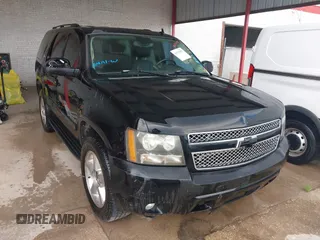 2007 Chevrolet Tahoe LT with VIN 1GNFC13077R151420, listed as a IAAI auction lot 42575597 with 141,656 mi miles and . Bid and sale history available at DreamBid. Image 1.
