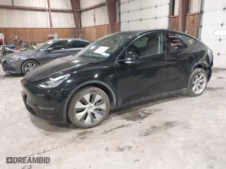 2021 Tesla Model Y Long Range with VIN 5YJYGDEE2MF244461, listed as a IAAI auction lot 41633855 with 54,584 mi miles. Bid and sale history available at carsss.com. Image 19.