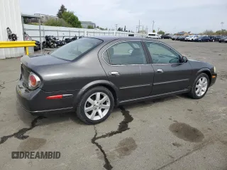 2002 Nissan Maxima GLE с VIN JN1DA31A12T323002, выставлен на аукционе Copart как лот 49682205 с пробегом 99 681 миль миль и Списание • Salvage title. История ставок и продаж доступна на DreamBid. Изображение 3.