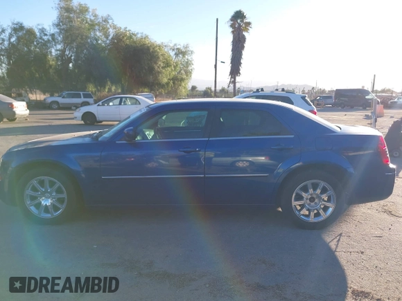 2009 Chrysler 300 Touring with VIN 2C3LA53V89H565270, listed as a IAAI auction lot 41069505 with 112,830 mi miles. Bid and sale history available at carsss.com. Image 14.