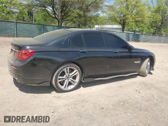 2014 BMW 7 Series 750i xDrive with VIN WBAYB6C52ED224536, listed as a Copart auction lot 54397595 with 107,410 mi miles and Salvage title. Bid and sale history available at DreamBid. Image 3.