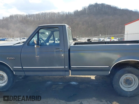 1995 Ford F-250 with VIN 2FTHF25H8SCA12128, listed as a IAAI auction lot 41806359 with 90,950 mi miles. Bid and sale history available at carsss.com. Image 14.