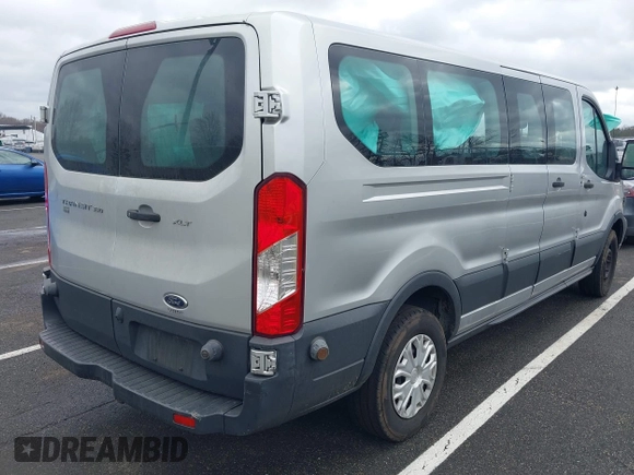 2018 Ford Transit Passenger XL z VIN 1FBZX2ZM2JKB02141, wystawiony jako IAAI lot #41914073 z przebiegiem 103 718 mil mil oraz . Historia ofert i sprzedaży dostępna na DreamBid. Obrazek 4.
