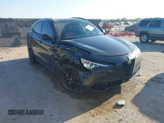 2020 Alfa Romeo Stelvio Sport z VIN ZASPAJAN1L7C97519, wystawiony jako IAAI lot #42038301 z przebiegiem 57 636 mil mil oraz . Historia ofert i sprzedaży dostępna na DreamBid. Obrazek 1.