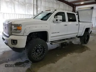 2016 GMC Sierra 3500HD Denali z VIN 1GT42YE85GF142148, wystawiony jako Copart lot #77083234 z przebiegiem 202 754 mil mil oraz Szkoda całkowita • Salvage title. Historia ofert i sprzedaży dostępna na DreamBid. Obrazek 1.