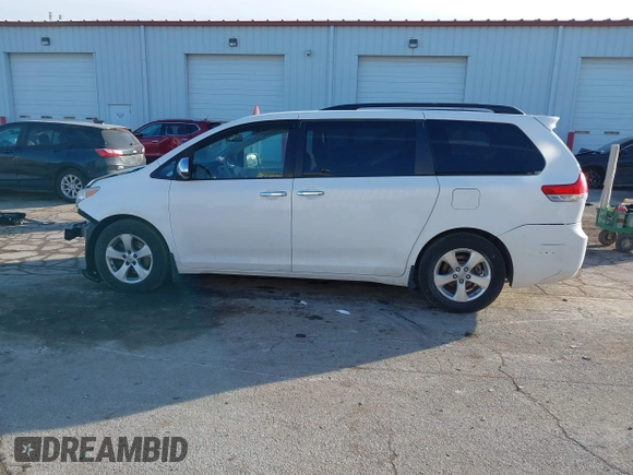 2014 Toyota Sienna LE AAS with VIN 5TDKK3DC2ES483679, listed as a IAAI auction lot 41547261 with 142,697 mi miles. Bid and sale history available at carsss.com. Image 15.