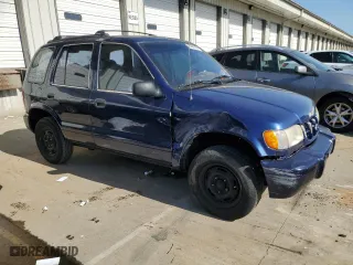 1999 Kia Sportage with VIN KNDJB7231X5614082, listed as a Copart auction lot 75604744 with 130,977 mi miles and Salvage Title. Bid and sale history available at carsss.com. Image 4.